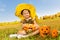 Halloween girl in costume of a bee sitting