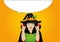 Halloween. Girl in hat and witch costume Gesture of hands up on
