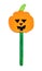 Halloween hand made bookmark wth a pumpkin on a craft stick isolated on white with clipping path