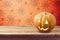 Halloween holiday background with pumpkin on wooden table