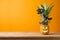 Halloween holiday concept with jack o lantern pineapple on wooden table