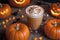 halloween holiday decoration with latte and pumpkins, still life, cozy, festive background