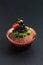 Halloween Holiday food colorful fancy brownies cupcake with black cat and pumpkin fondant decorate