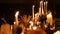 Halloween holiday table with candles and pumpkins