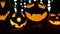 Halloween and holidays concept - spooky jack-o-lantern or carved pumpkin. Close up. Black bokhe background