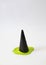 Halloween inspiration design idea.witch black hat made of ice cream cone melting in green strange mixture.spooky concept
