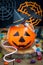 Halloween Jack o Lantern bucket overflowing with candy, spooky decorations on background, vertical