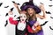 Halloween kids, Happy scary girl and boy dressed up in halloween costumes of witch, sorcerer and vampire Dracula for pumpkin patch