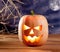 Halloween lantern pumpkin in dark sky clouds