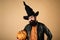 Halloween man with pumpkin - Holidays celebration concept. Happy Halloween. Halloween Man posing with pumpkins. Young