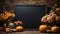 Halloween mockup space with pumpkins, flowers and fallen leaves. Black board with autumn holiday decoration