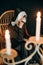 Halloween mystic nun hood candle candelabrum fire