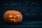 Halloween Night alone Pumpkin dark wooden background