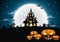 Halloween night background with pumpkin, haunted house