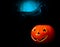 Halloween night background with scary dark tomb background and pumpkin