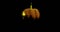 Halloween night the ghoulish smile and yellow eyes of a pumpkin spinning in an animated rendering from the aerial view to