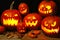 Halloween night scene with a group of Jack o Lanterns