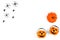 Halloween party. Decorations for halloween on a white background, copy space. Pumpkins and spiders on a white background, top view