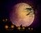 Halloween party with pumpkins devils celebrated with their friends in full moon dark night background