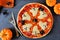 Halloween pizza, above scene with decor on black background