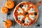 Halloween pizza, above scene with decor on wood