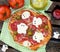 Halloween pizza with cheese ghosts ans olive spiders