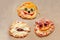 Halloween pizza with monsters, above scene with decor on a craft paper box background, idea for home party food, easy, healthy