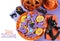 Halloween plate of homemade cookies as centerpiece for trick or treat table.