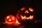 Halloween pumkins on the black background