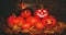 Halloween. pumpkin with burning eyes on wooden background