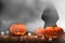 Halloween pumpkin candle lights at wooden planks with deep fog 3