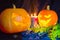 Halloween pumpkin. Candles, bat and glowing pumpkin. Harvest for Halloween. Dark atmosphere for holiday