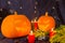 Halloween pumpkin. Candles, bat and glowing pumpkin. Harvest for Halloween. Dark atmosphere for holiday