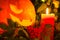 Halloween pumpkin. Candles, bat and glowing pumpkin. Harvest for Halloween. Dark atmosphere for holiday