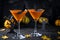 Halloween pumpkin cocktail. Food Concept, glasses with black bats and holiday decorations on dark background