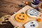 Halloween pumpkin cupcake and homemade biscuit for kid in autumn season