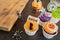 Halloween pumpkin cupcake and homemade biscuit for kid in autumn season