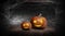 Halloween pumpkin on a dark background with smoke and fog at night