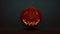 Halloween Pumpkin with a flickering candle in a dark room - 3D Render