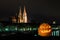 Halloween pumpkin in front of Cathedral and Danube river in germany, Germany