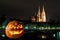 Halloween pumpkin in front of Cathedral and Danube river in germany, Germany