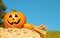 Halloween Pumpkin, funny Jack O\'Lantern on Straw Bale