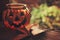 Halloween pumpkin glass candlestick with autumn leaves