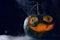 Halloween Pumpkin glowing from inside with mystery foggy smoke