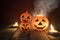 Halloween pumpkin lantern candle light on wooden with smoke - head jack o lantern funny spooky holiday decorate on halloween