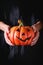 Halloween Pumpkin lantern in child\'s hands