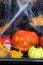 Halloween pumpkin in the mystical house window with rain drope and spider web