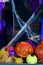 Halloween pumpkin in the mystical house window with rain drope and spider web