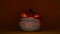 Halloween pumpkin in protective mask, glowing Jack lantern, Covid-19 quarantine