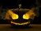 Halloween pumpkin resting on a wooden table